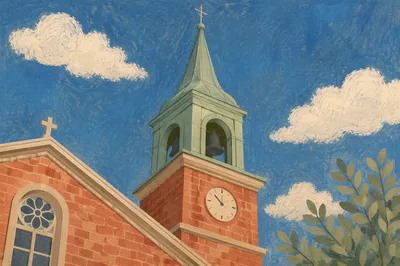 Historic Church Bell Tower Under Blue Sky