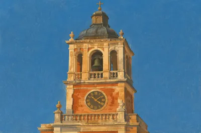 Historic Church Bell Tower Under Blue Sky