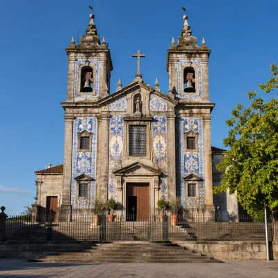 Historic Church Bell Towers Under Blue Sky
