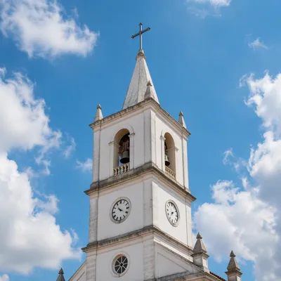 White Church Bell Tower Under Blue Sky