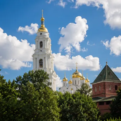 Historic Church Bell Tower Under Blue Sky