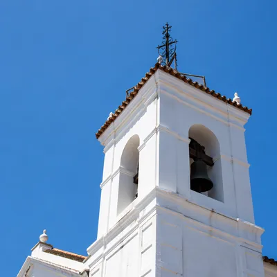 White Church Bell Tower Under Blue Sky