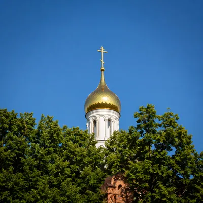 Historic Church Bell Tower Under Blue Sky