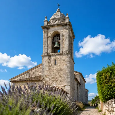 Historic Church Bell Tower Under Blue Sky