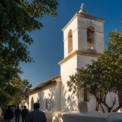 White Church Bell Tower Under Blue Sky