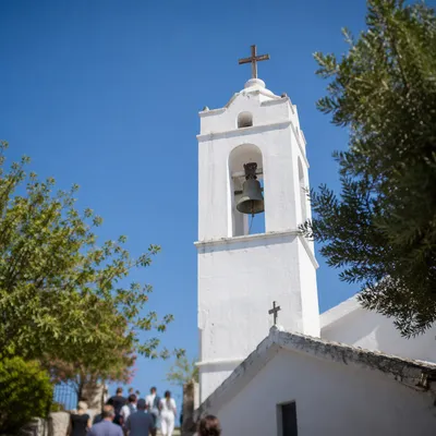 White Church Bell Tower Under Blue Sky