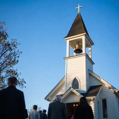 White Church Bell Tower Under Blue Sky