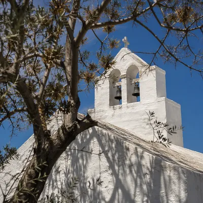 White Church Bell Tower Under Blue Sky