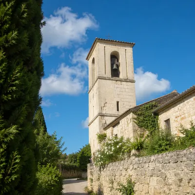 Stone Church Bell Tower Under Blue Sky