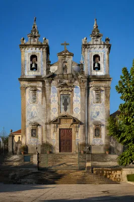 Historic Church Bell Towers Under Blue Sky