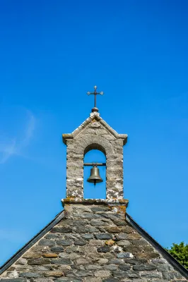 Rural Church Bell Tower Under Blue Sky