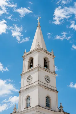 White Church Bell Tower Under Blue Sky