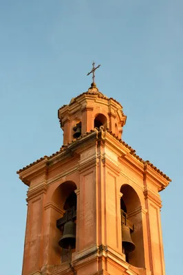 Historic Church Bell Tower Under Blue Sky
