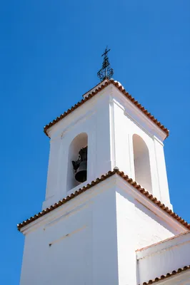 White Church Bell Tower Under Blue Sky