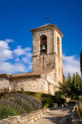 Historic Church Bell Tower Under Blue Sky