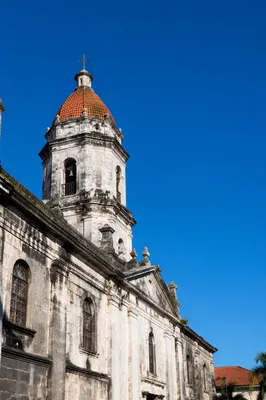 Historic Church Bell Tower Under Blue Sky