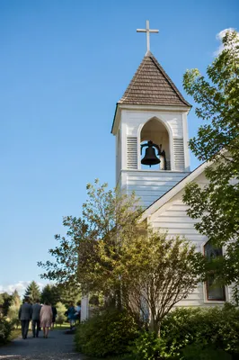 White Church Bell Tower Under Blue Sky