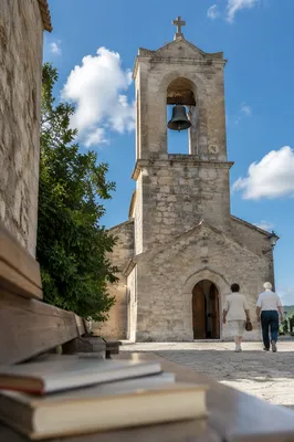 Stone Church Bell Tower Under Blue Sky