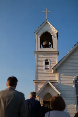 White Church Bell Tower Under Blue Sky
