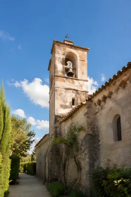 Stone Church Bell Tower Under Blue Sky