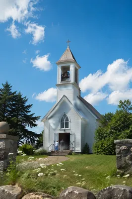 Rural Church Bell Tower Under Blue Sky