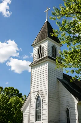 Country Church Bell Tower Under Blue Sky