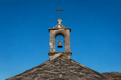 Rural Church Bell Tower Under Blue Sky