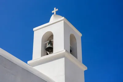 White Church Bell Tower Under Blue Sky