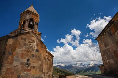Ancient Church Bell Tower Under Blue Sky