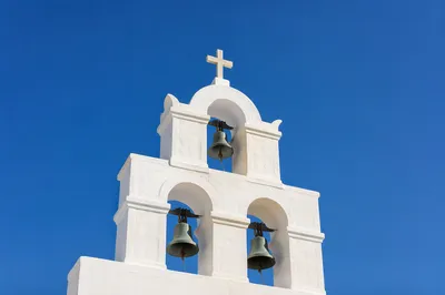 White Church Bell Tower Under Blue Sky