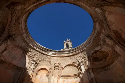 Historic Church Bell Tower Under Blue Sky