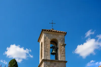 Historic Church Bell Tower Under Blue Sky