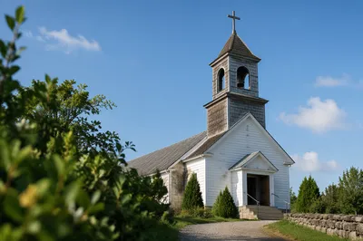 Modest Church Bell Tower Under Blue Sky