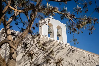 White Church Bell Tower Under Blue Sky