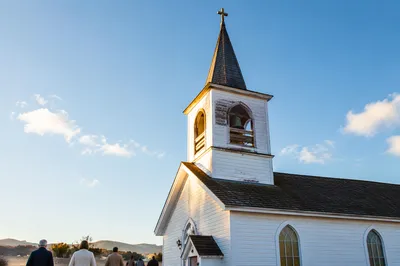 Rural Church Bell Tower Under Blue Sky