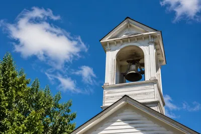 Wooden Church Bell Tower Under Blue Sky
