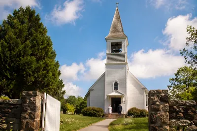 Rural Church Bell Tower Under Blue Sky