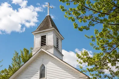 Country Church Bell Tower Under Blue Sky