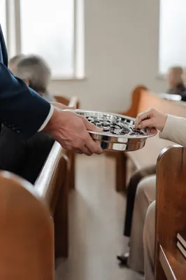 Deacon Serving Communion in Quiet Chapel