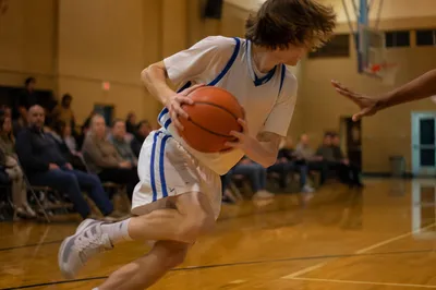 Youth Basketball Action in Church Gymnasium