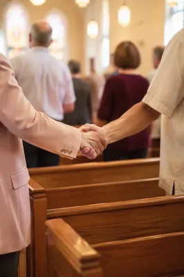 Warm Handshake During Church Greeting of Peace