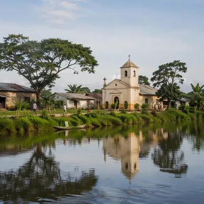 Rural Village Church Beside a Quiet River