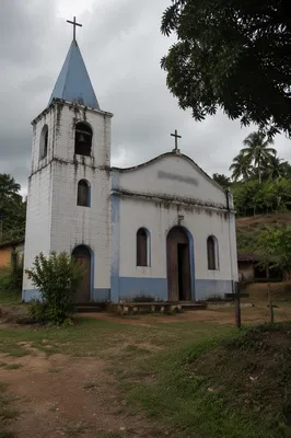 Modest Rural Village Church Under Overcast Sky