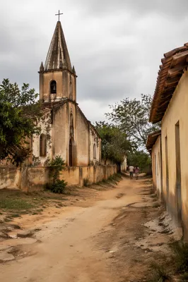Modest Village Church on Rural Dirt Lane