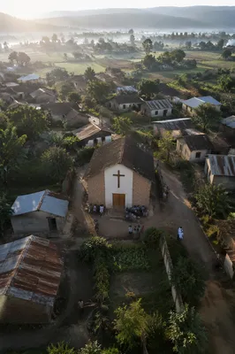 Rural Village Church at Misty Sunrise