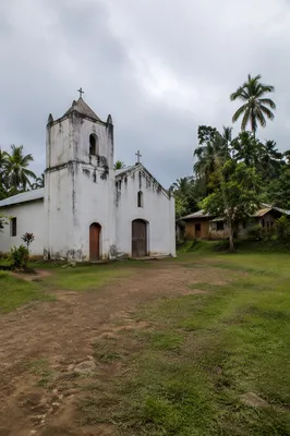 Humble Rural Village Church Under Overcast Sky