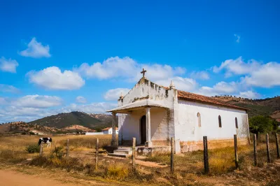 Rural Village Chapel Under Hopeful Blue Sky