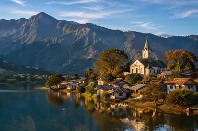 Mountain Village Church Beside a Peaceful Lake