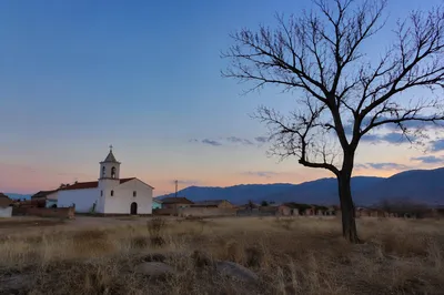 Modest Village Church in Rural Twilight