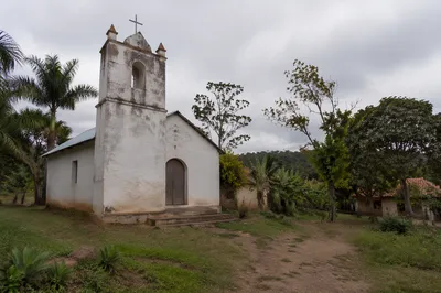 Humble Rural Village Church Under Overcast Sky